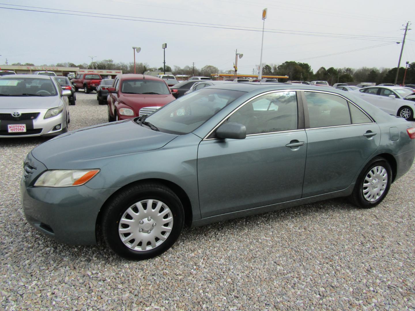 2009 Lt Green /Tan Toyota Camry (4T1BE46K19U) with an 4 Cyl engine, Automatic transmission, located at 15016 S Hwy 231, Midland City, AL, 36350, (334) 983-3001, 31.306210, -85.495277 - Photo#2